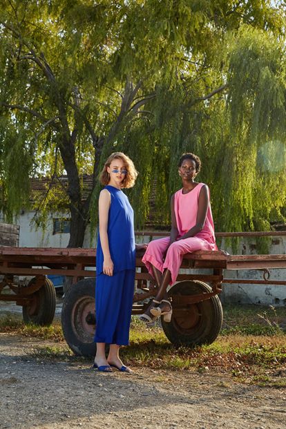 Pink blouse pants suit