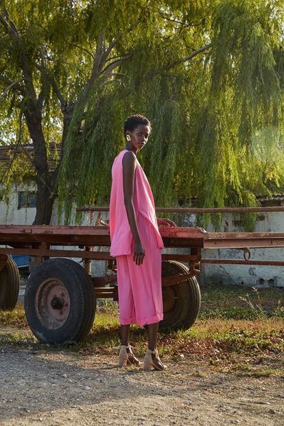 Pink blouse pants suit