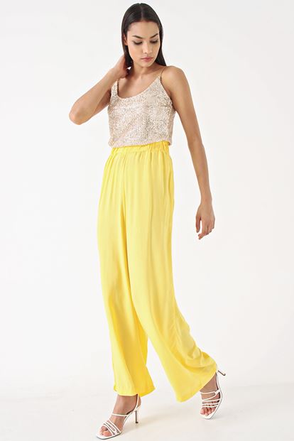 Yellow Pants & Sequins Tops Team