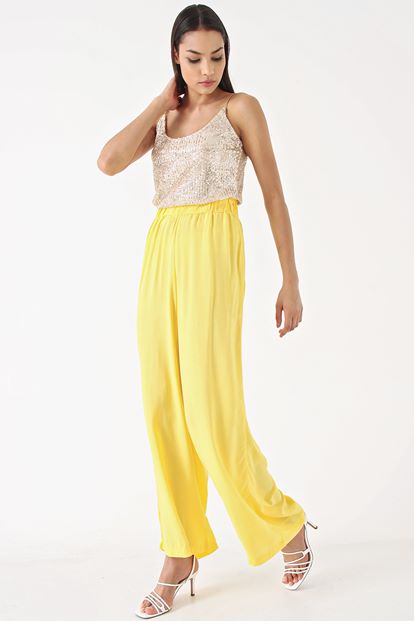 Yellow Pants & Sequins Tops Team