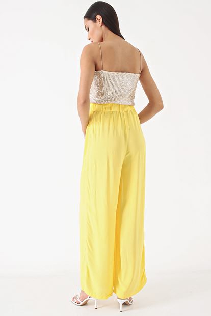 Yellow Pants & Sequins Tops Team