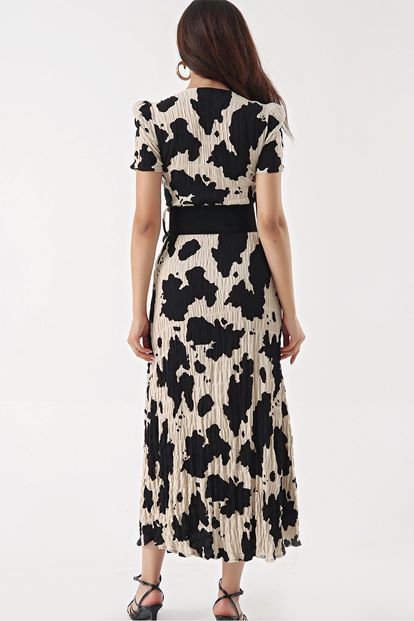 Cream paint pattern arched dress