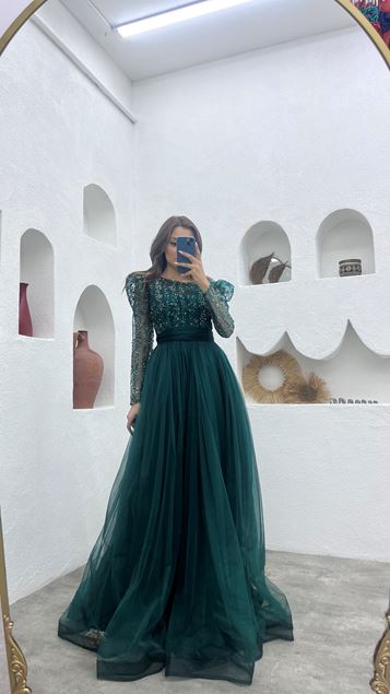 Abito da sera in tulle drappeggiato glitter verde