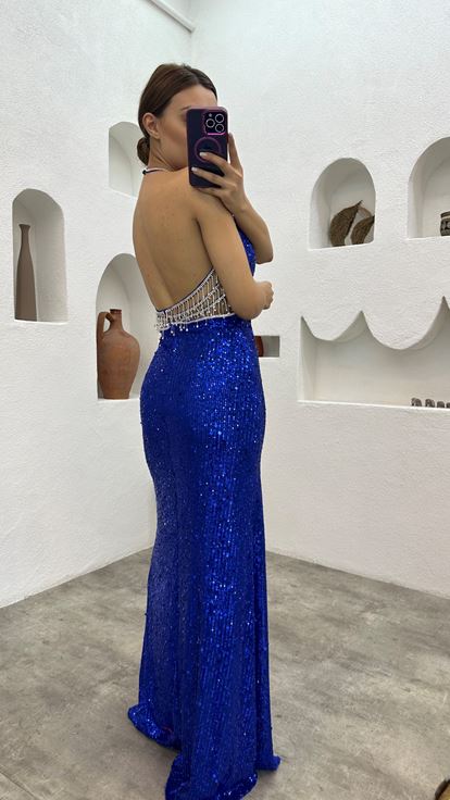 Abito da sera con paillettes e motivo in vita di Saks