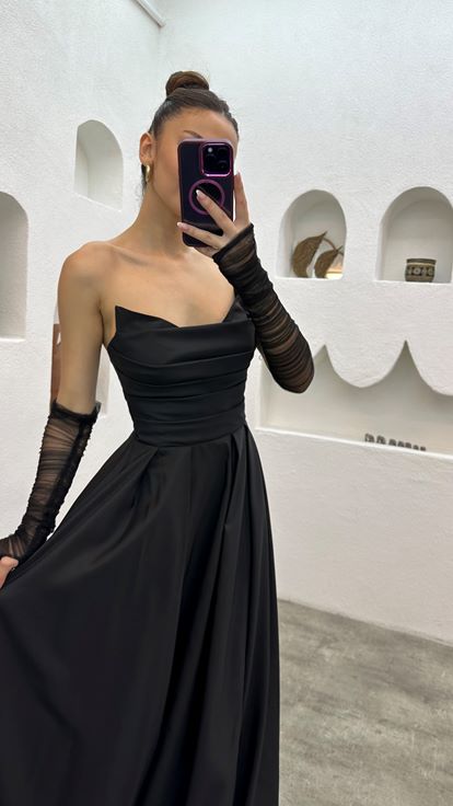 Detalle de manga palabra de honor negro lbise