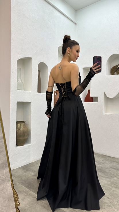 Detalle de manga palabra de honor negro lbise