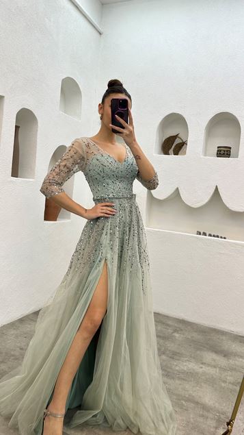 Abito da sera in tulle ricamato verde