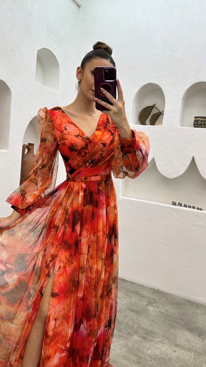 فستان سهرة برتقالي بأكمام بالون