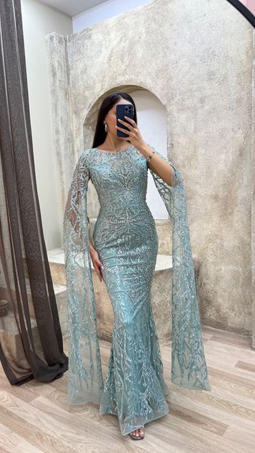 Detalle de la manga verde menta Vestido de noche de diseño bordado