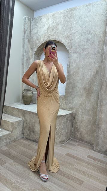 Abito da sera con paillettes dal design con dettagli in volant beige