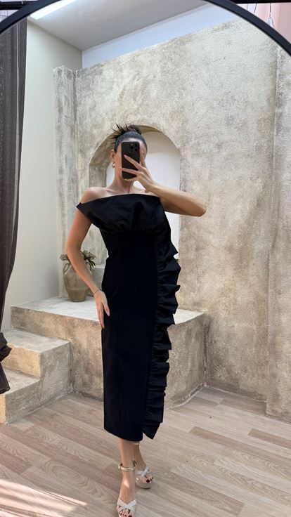 Schwarzes trägerloses Designer Kleid mit Rüschendetails