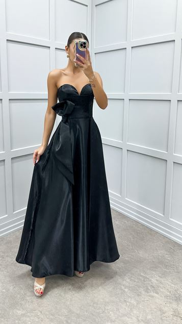 Schwarzes trägerloses Kleid mit Schleifenmuster an der Taille