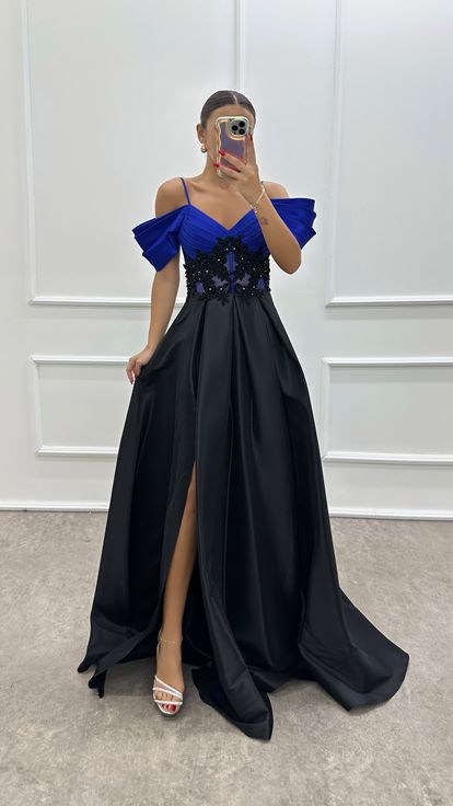 فستان سهرة بتفاصيل حزام الخصر من ساكس