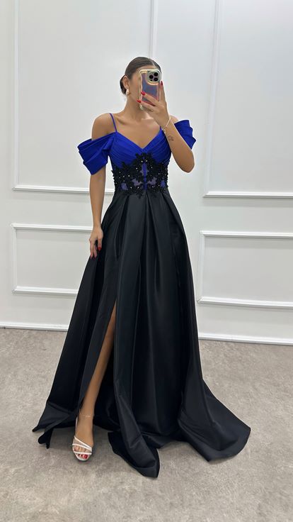 فستان سهرة بتفاصيل حزام الخصر من ساكس