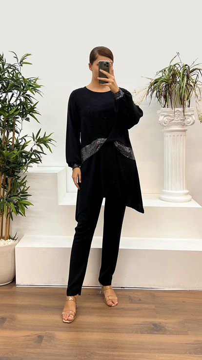 Completo da sera taglie forti con dettaglio in vita argentata