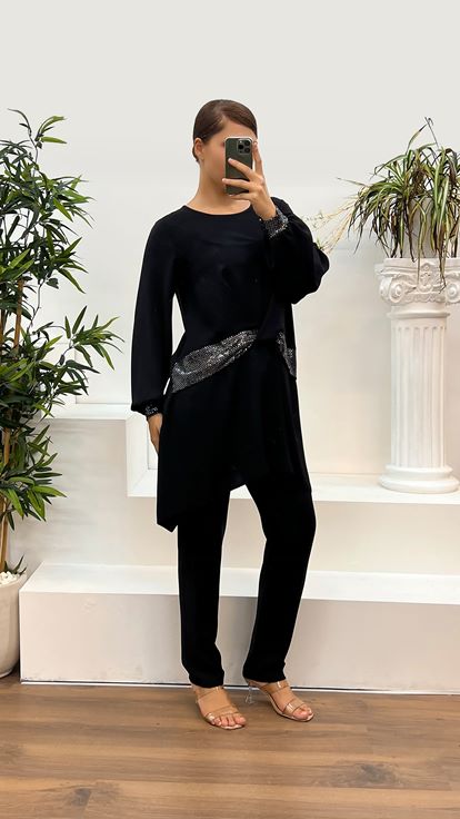 Completo da sera taglie forti con dettaglio in vita argentata