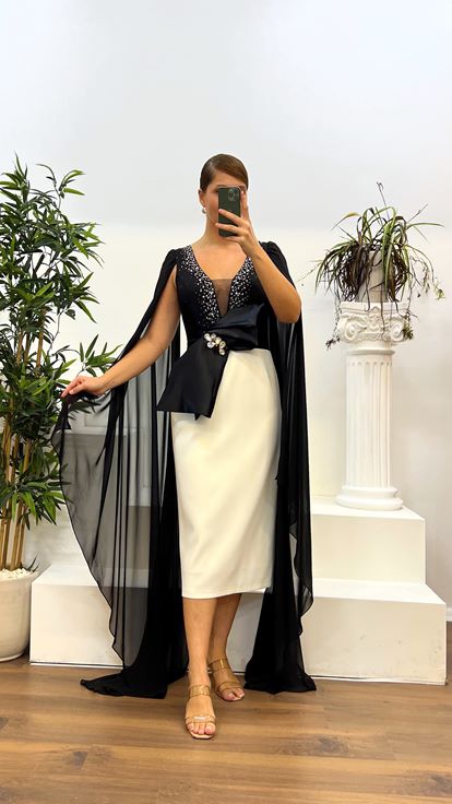 Abito da sera taglie forti con dettaglio manica longuette in osso nero