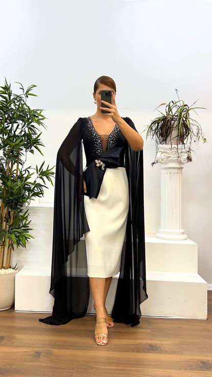 Abito da sera taglie forti con dettaglio manica longuette in osso nero