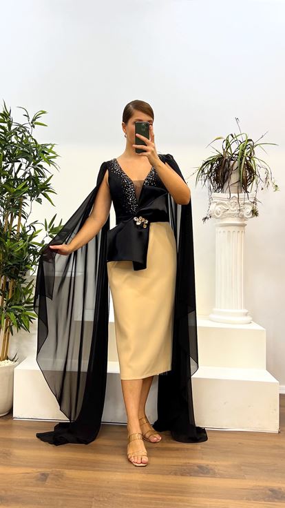 فستان سهرة بمقاس متوسط ​​وأكمام طويلة من الذهب الأسود