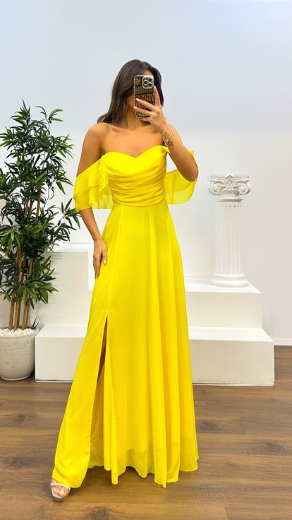 Abito da sera in chiffon drappeggiato sul petto giallo