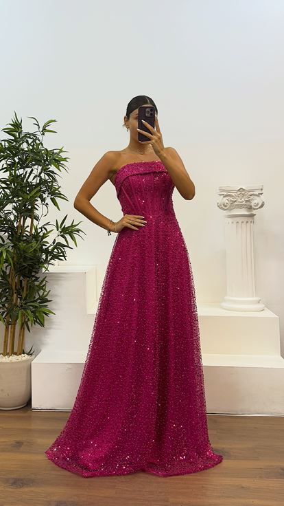 Abito da sera in rilievo senza spalline fucsia