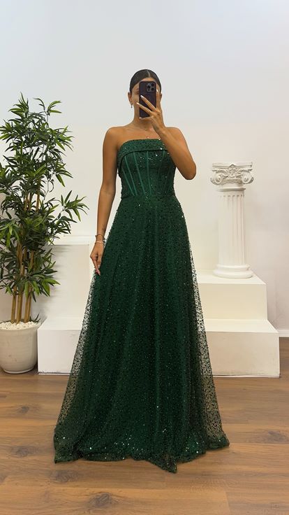 Abito da sera con perline senza spalline verde