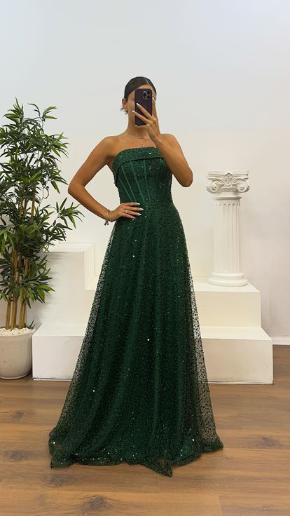 Abito da sera con perline senza spalline verde