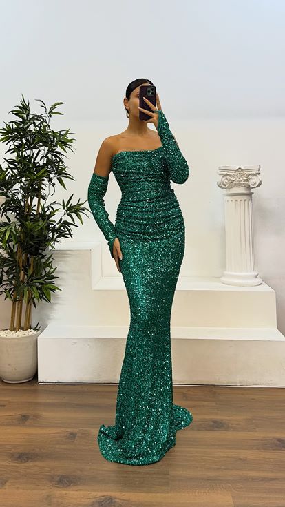 Abito da sera con paillettes senza spalline verde acqua