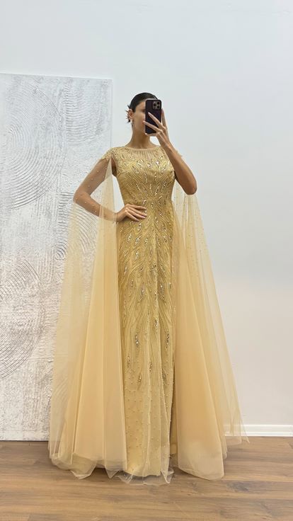 Robe de soirée brodée en tulle doré