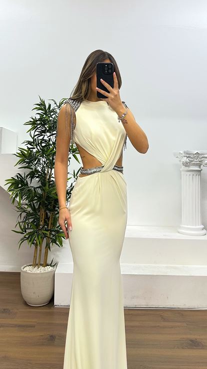 Off white evening dress with shoulder and waist detail 