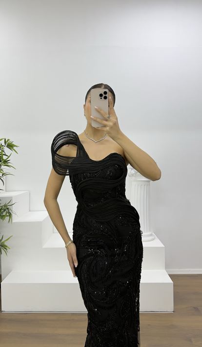 Abito tubino nero senza spalline con decorazioni in pietra