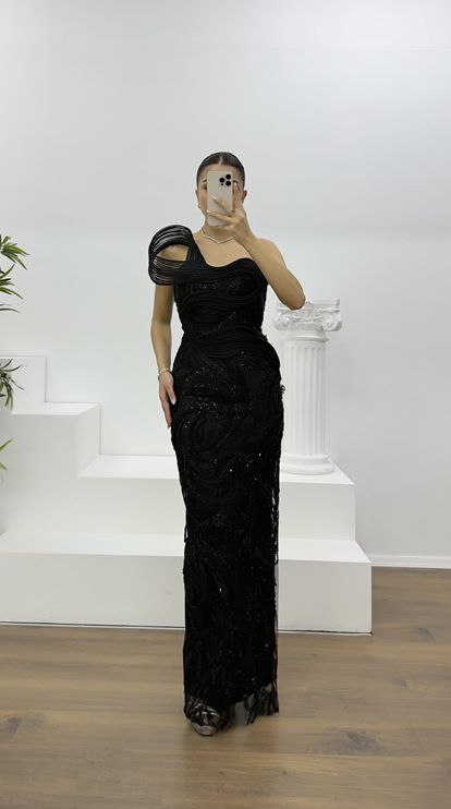 Abito tubino nero senza spalline con decorazioni in pietra