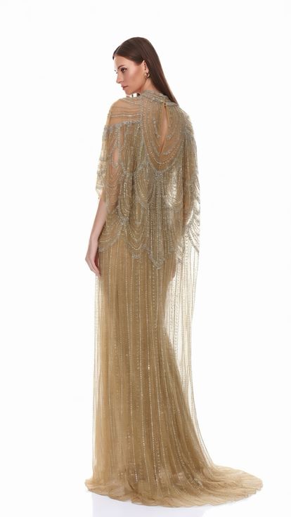 Robe de soirée crème à manches chauve souris courtes brodée